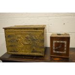 A 1930s mantle clock together with a brass coal box.