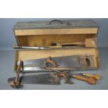 Vintage carpenters tool box with a selection of tools to include Buck screwdrivers and saw.