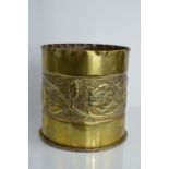 A large WWI trench art brass shell