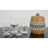 A group of vintage BOAC airline glasses and a stoneware jar and cover, 14cm high.