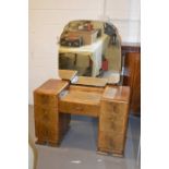 A 1940s mirrored back dressing table.