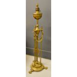 A Victorian brass standard paraffin lamp, with height adjustable column, 143cm high (not extended).