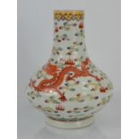 A Chinese vase depicting a five clawed red dragon with Quinlong marks to base 23cms