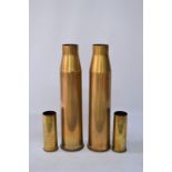 Trench Art; two large shells, and a pair with engraved decoration. Tallest 62cms