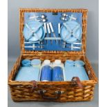 Vintage Sirram picnic set in a wicker basket