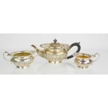 A silver tea set, comprising tea pot, sugar bowl and milk jug, Birmingham 1927, by Alexander