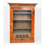 A Queen Anne period glazed walnut cabinet, with three interior shelves above pigeon holes, bearing