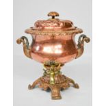 A 19th century copper and brass samovar, the cover embossed with decoration, scroll handles and
