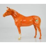 A Beswick Palamino horse, 20cm high.