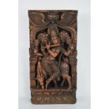 A Highly detailed hardwood carving of a Hindu deity 46cm