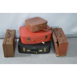 Five vintage suitcases