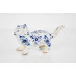 A 19th century Delft blue and white cat, 9½ cm high.