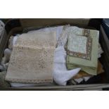 A suitcase of vintage crochet linen and fabric