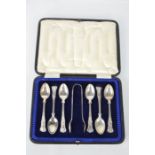 A set of silver teaspoons and sugar tongs, Sheffield 1917, 4.05toz.