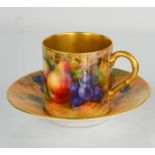 A Royal Worcester coffee can and saucer, hand painted with fruits, signed Hale, with gilded