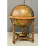 A large world globe bar on stand, with a fitted interior, 112cm high.