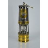A Hailwood & Akroyd Ltd miners lamp, no 11, Type 01B, 17cm high.