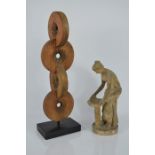 A classical style composite figure of a maiden gazing into a birdbath, 29cms , together with a