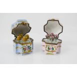 Two Limoges porcelain scent bottle boxes, each containing four glass scent bottles, 4½cm high.