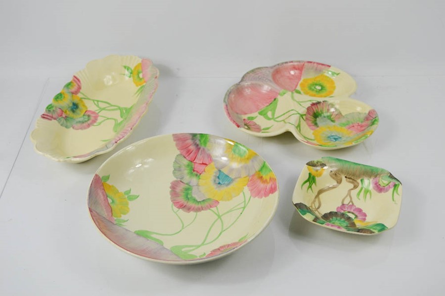 Clarice Cliff for AJ Wilkinson and Newport Pottery, four dishes.