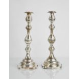 A pair of silver candlesticks, London 1926, 35cm high, 20.83toz.