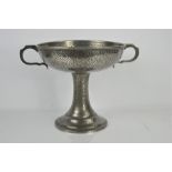 An Arts & Crafts planished pewter fruit bowl. 22cm