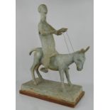 A large mid 20th century clay & plaster Marquette of a figure astride an ass, in the manner of