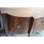 A Regency mahogany sideboard, the break front having a single drawer above a frieze drawer with a