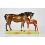 A Beswick horse group; Mare & Foal, numbered 1811 to the base, 16cm high.