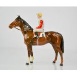 A Beswick race horse and jockey, 20cm high.