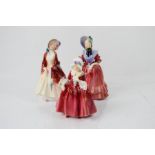 Three Royal Doulton ladies; Paisley Shawl HN1988, Lady Betty HN1976 16½cm high, and Lavinia HN1955.