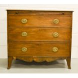 A Georgian mahogany bachelors chest, with brush slide, and three graduated drawers, with shaped