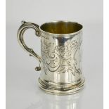 A 19th century silver tankard, engraved with scrollwork and bearing monogram to the centre of a