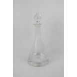 A cut glass decanter 36cm high.