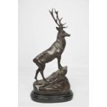 A 19th century James Moigniez bronze sculpture of a stag, raised on a rocky base, signed, 74cm