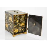 A Japanese black lacquered and gilt 'Zushi-dana' cabinet, composed of various sized drawers with