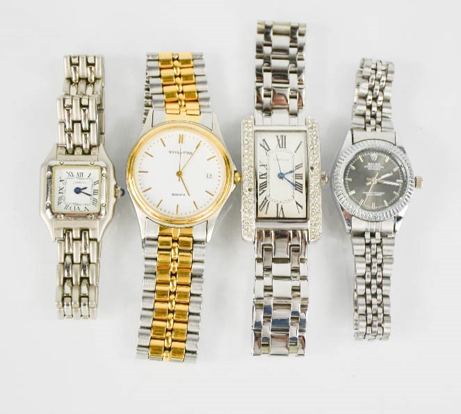 Four designer watches, after Cartier, Rolex and Titus.