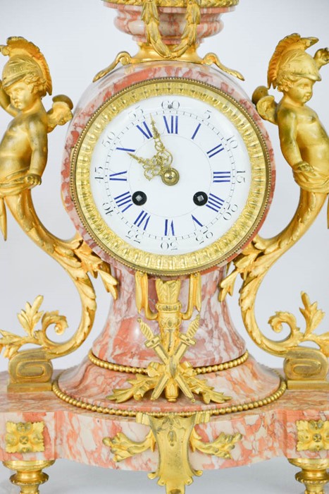 A 19th century French gilt metal and pink marble clock garniture, stamped H & F Paris, the clock - Image 3 of 4