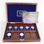 The Danbury Mint Queens Beast silver coin collection, with seven cased silver coins, original