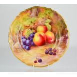 A Royal Worcester plate, hand painted with apples, grapes and blackberries, signed Horice Price,