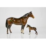 A Beswick horse and foal, 20cm high.