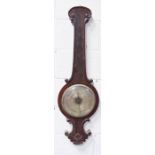 A 19th century wheel barometer.