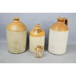 Three large stoneware flagons together with a small Ye Olde English country wine company example.