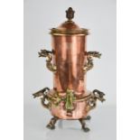 A 19th century copper and brass samovar, the four handles in the form of dolphins, with brass tap.