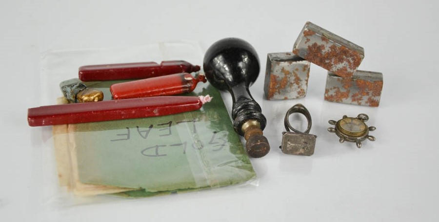 Two 19th century seals, together with wax, book of gold leaf, and a compass.