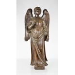 A 17th century Italian oak carved angel, 67cm high.