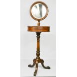 A Victorian mahogany gentleman's shaving mirror, with two compartments, bearing makers stamp, raised