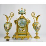 A Japy Freres French porcelain clock garniture, the clock having an eight day movement, striking