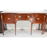 A 19th century mahogany sideboard, with central drawer flanked by cupboard doors. 96cms tall x