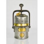 A 19th century miners The Premier Lamp, bearing registered number 686127, 22cm high.